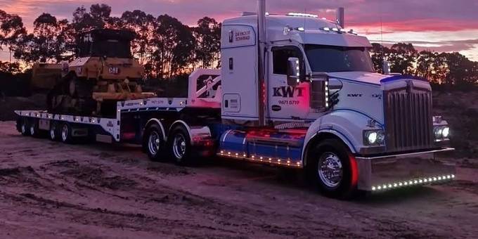 Machinery loaded on a KWT low loader — machinery transport Sydney