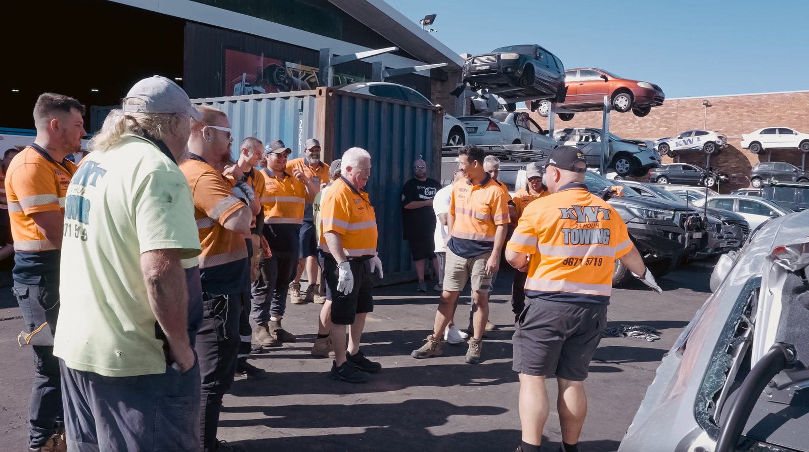 KWT crew gathered for a toolbox talk at the yard