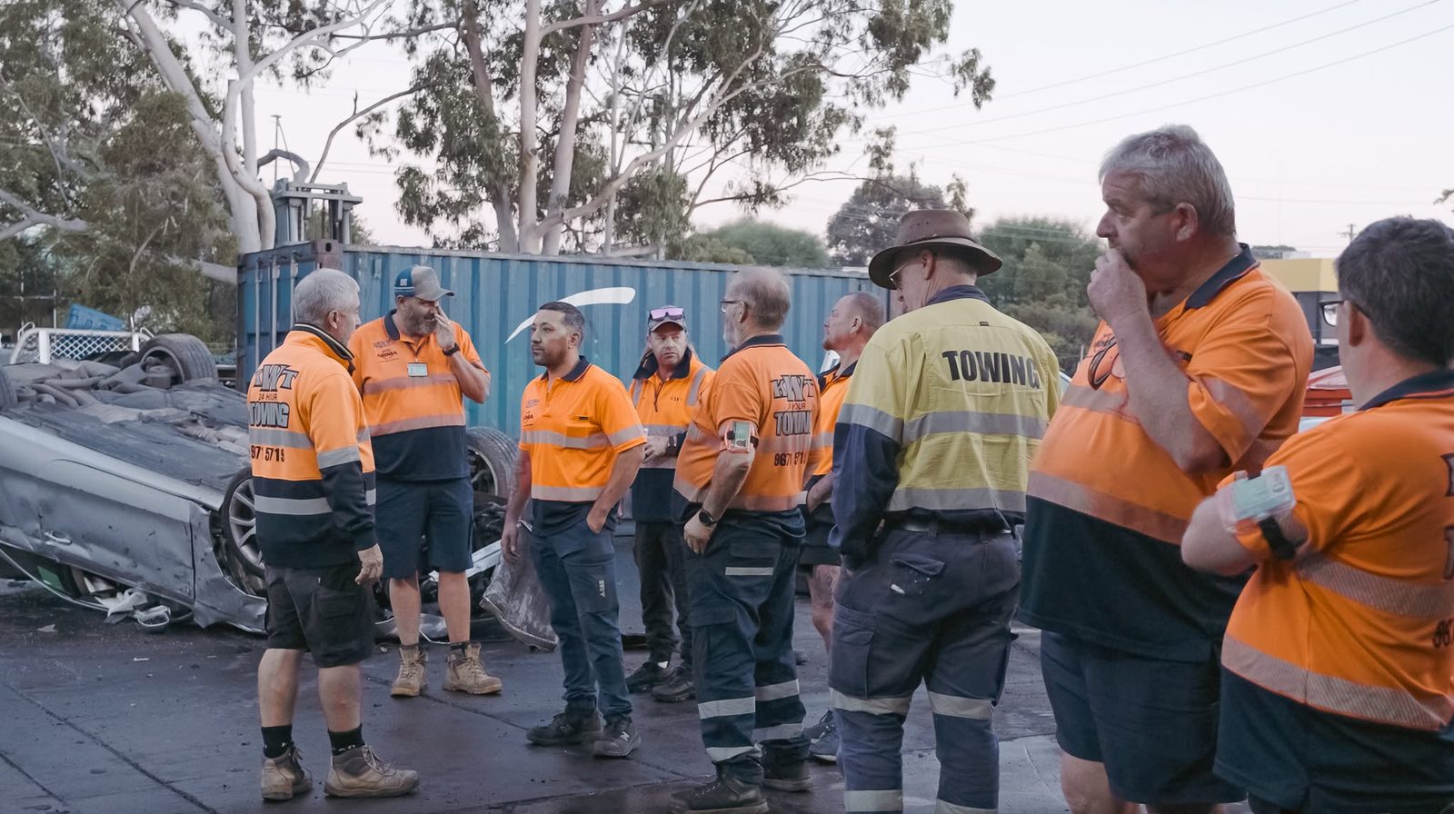 KWT team members discussing a job at the depot