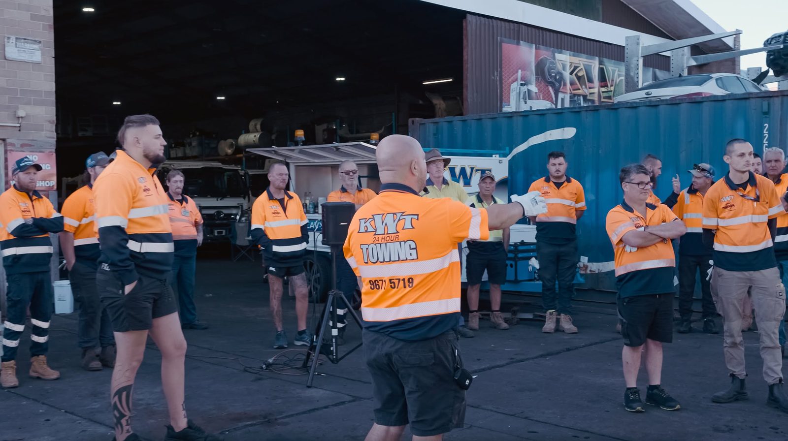 KWT crew gathered in the workshop for a training session