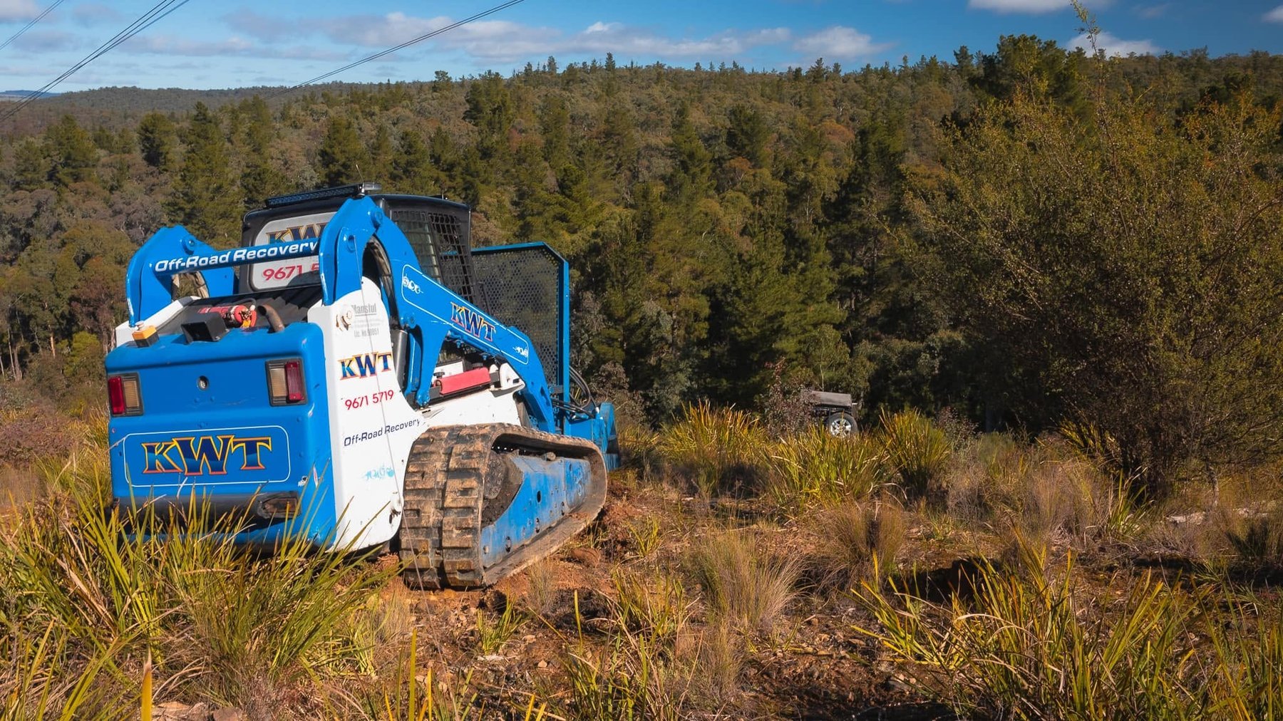 Off-road heavy recovery track loader, bushland NSW