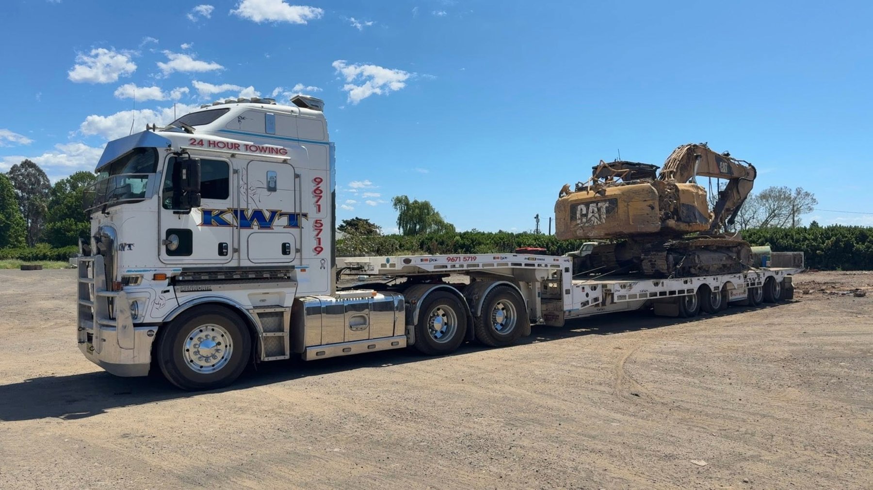 Heavy plant transport on country road