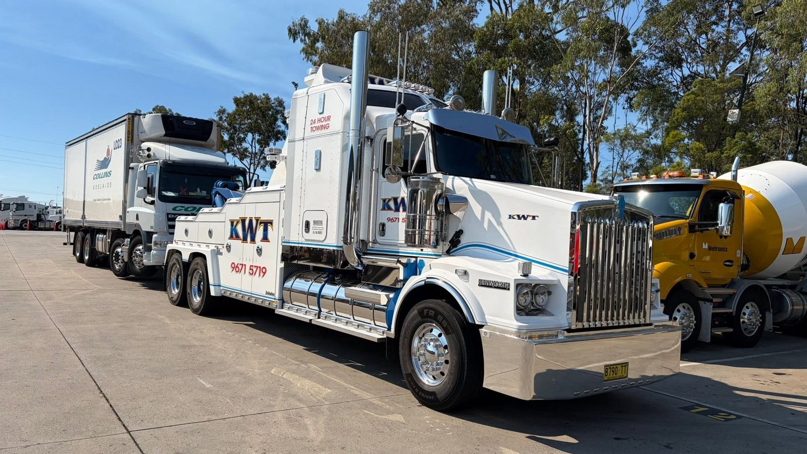 KWT prime mover and low loader on the road, professional oversized transport