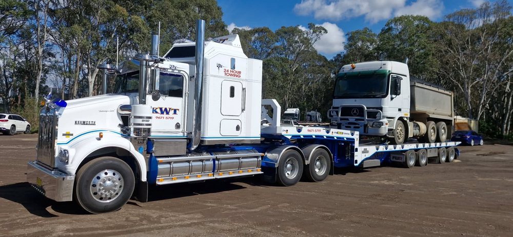 KWT tilt tray truck for container transport