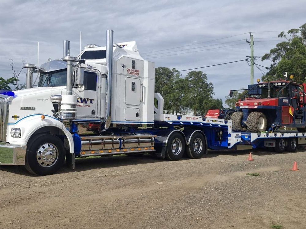 Excavator transported on a KWT low-loader