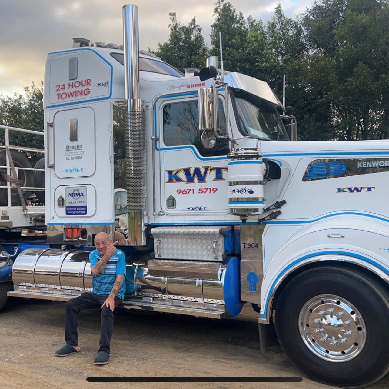 Kevin Waters & Sons tow truck in the original livery, with the KWT name alongside it