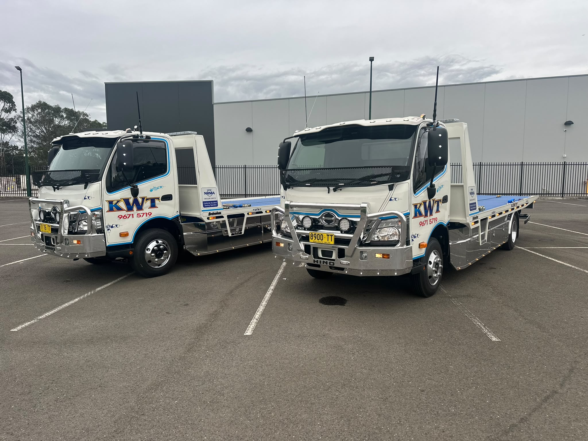 KWT tow truck fleet lined up, ready for 24/7 dispatch